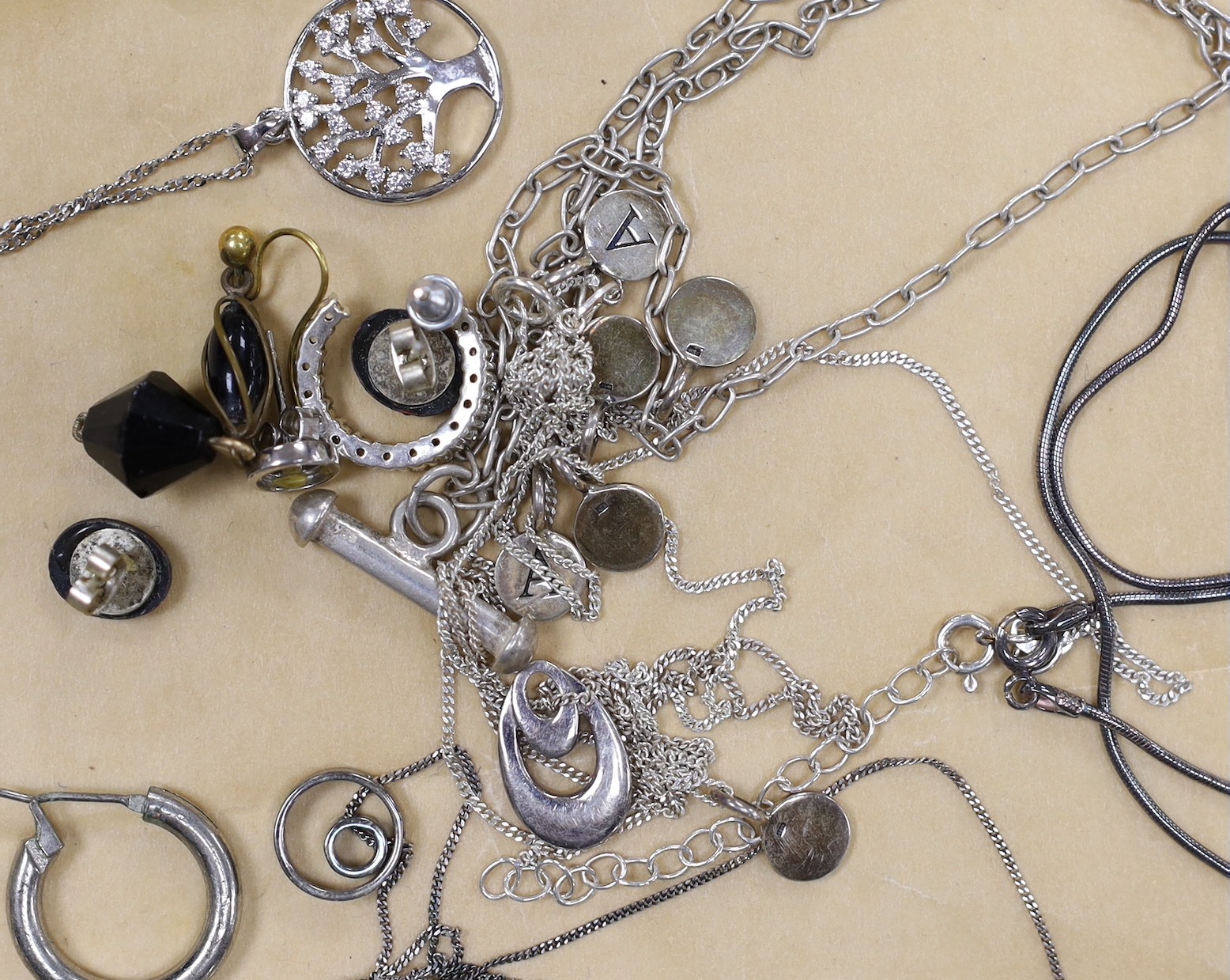 A collection of assorted silver and white metal jewellery, including marcasite
